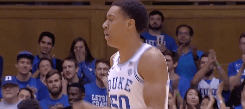 Justin Robinson on the basketball court. Justin Robinson on the basketball court.