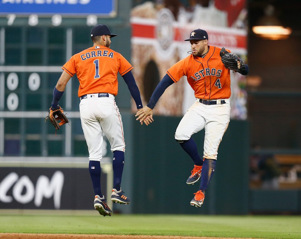Houston Astros outfielders Carlos Correa and George Springer