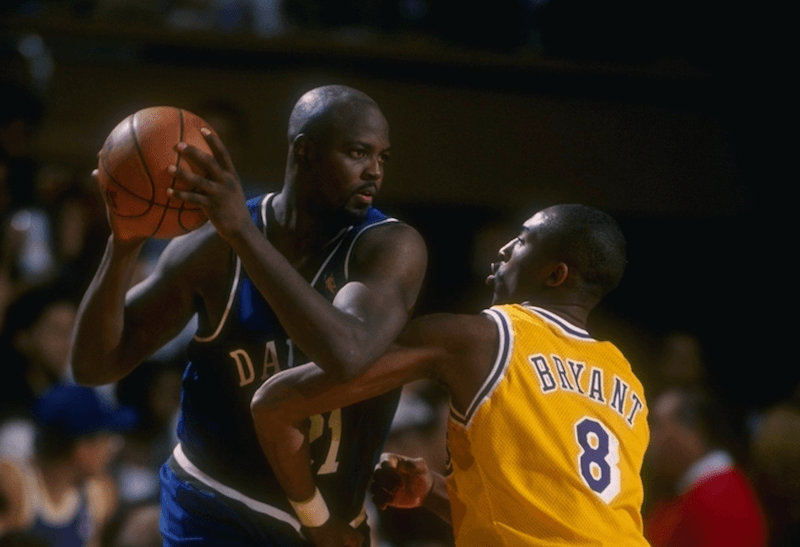 Kobe Bryant in his uniform on the basketball court. Kobe Bryant in his uniform on the basketball court.
