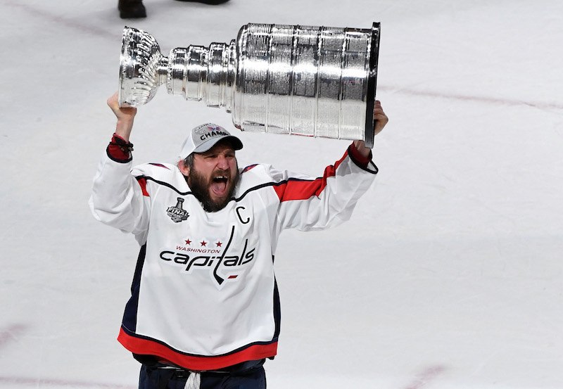 Alex Ovechkin raises the Stanley Cup