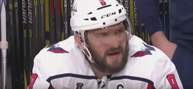 Ovechkin sitting on the bench.
