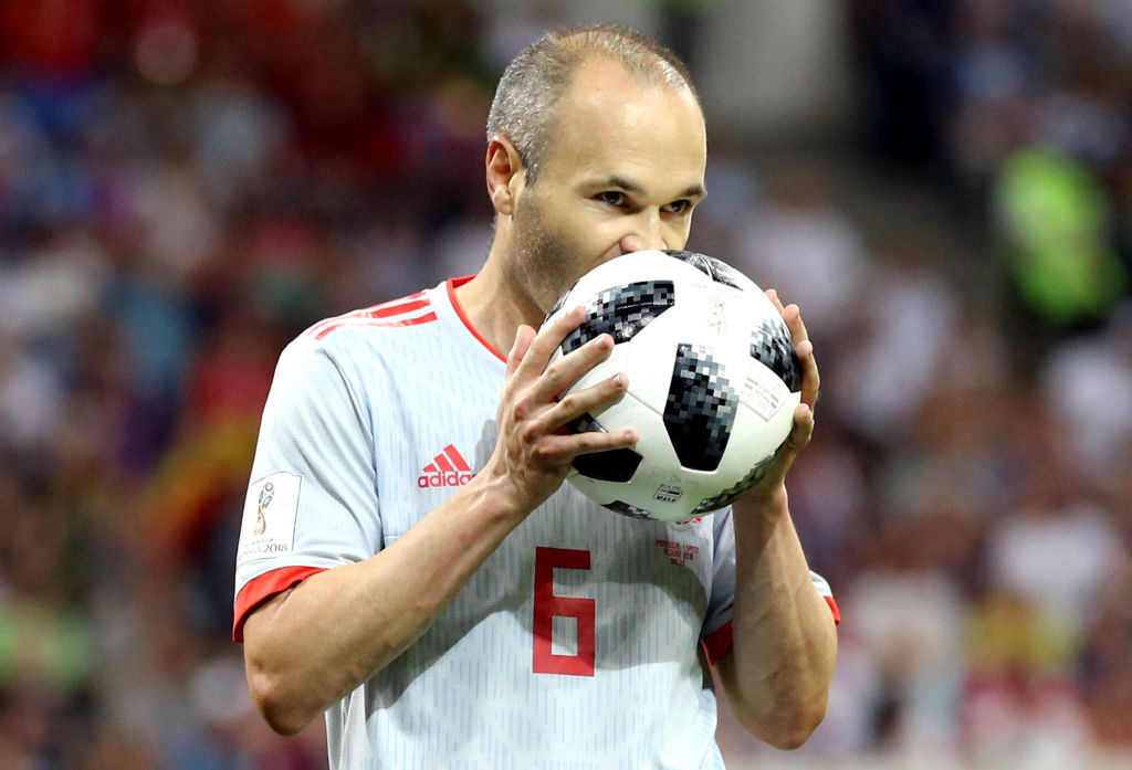 Andres Iniesta of Spain kisses the ball during the 2018 FIFA World Cup Russia group B match between Portugal and Spain at Fisht Stadium on June 15, 2018 in Sochi, Russia.