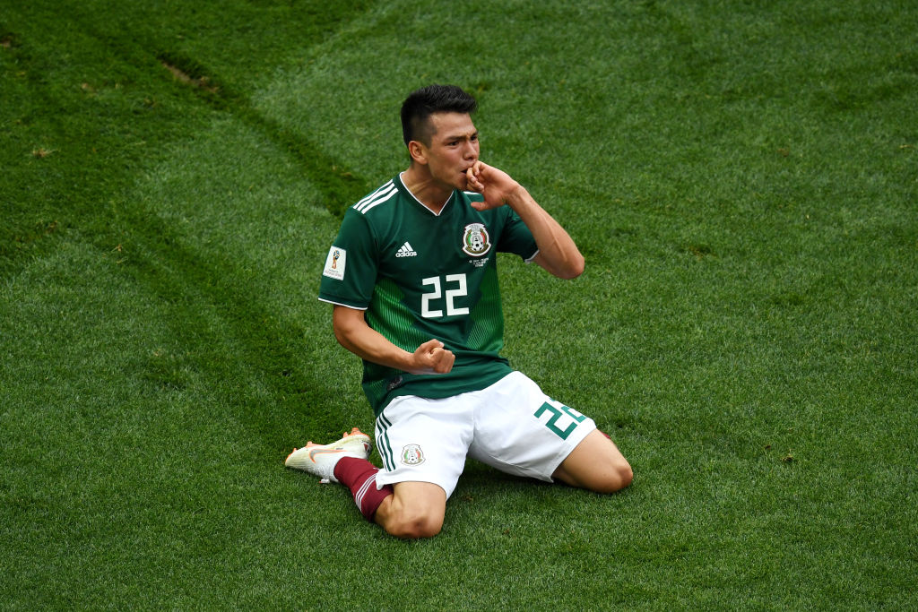 Hirving Lozano of Mexico celebrates by sliding on his knees after scoring his team's first goal during the 2018 FIFA World Cup Russia group F match between Germany and Mexico at Luzhniki Stadium on June 17, 2018 in Moscow, Russia.