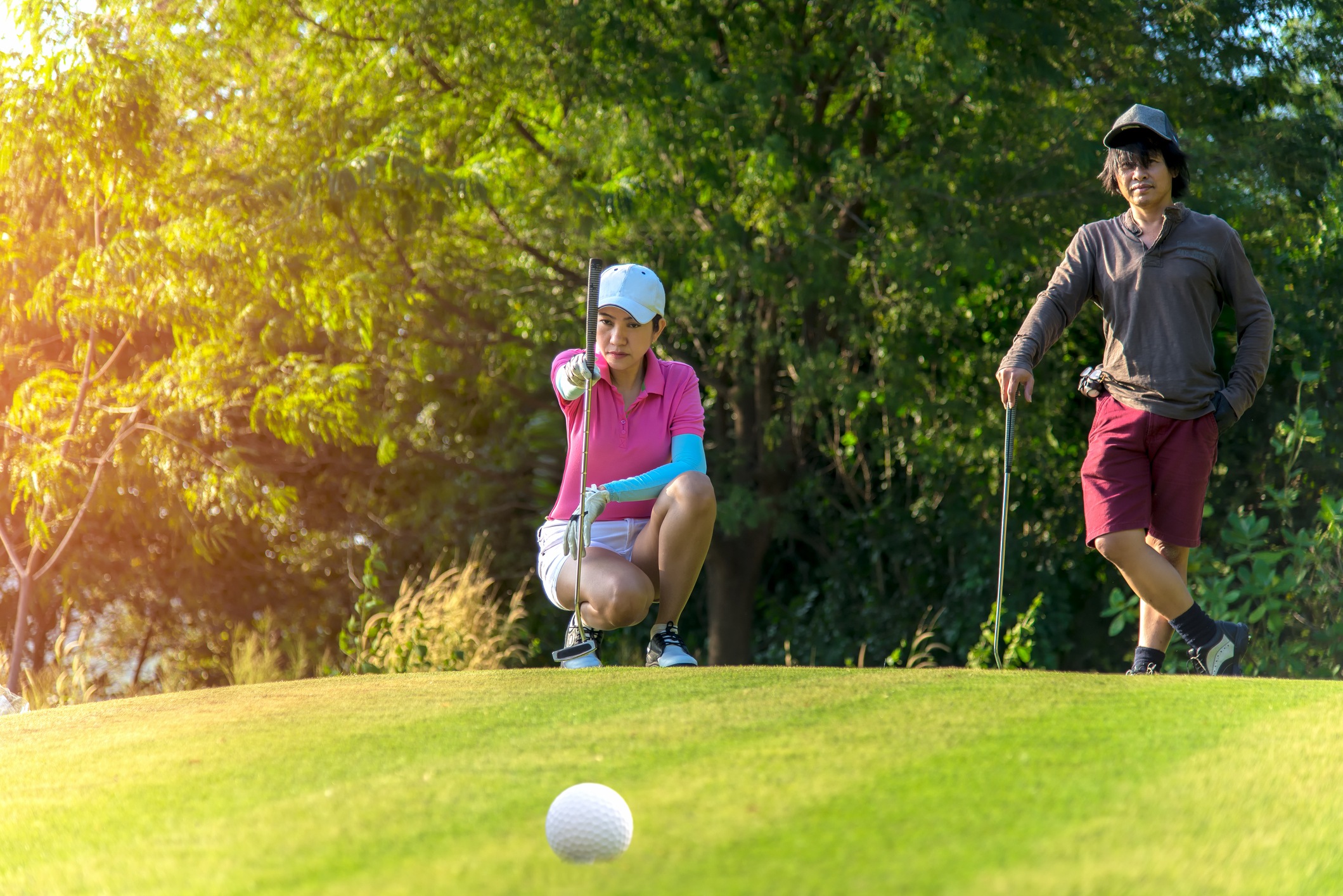 Golfer lining up a shot