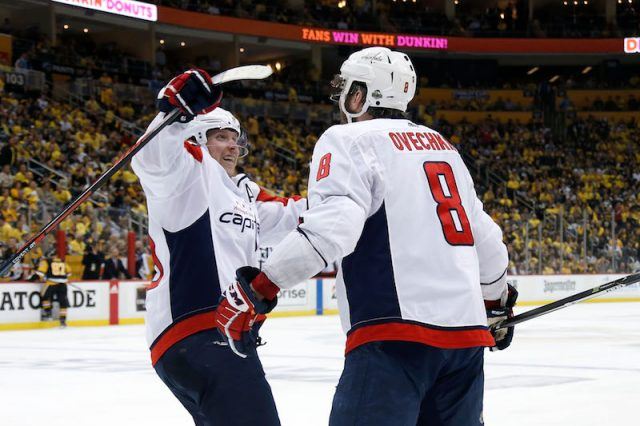 Ovechkin hugging his teammate. Ovechkin hugging his teammate.