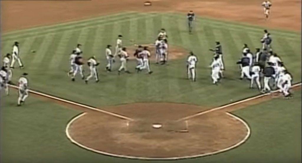 Players rush onto the field after Armando Benitez drills Tino Martinez with a pitch Players rush onto the field after Armando Benitez drills Tino Martinez with a pitch