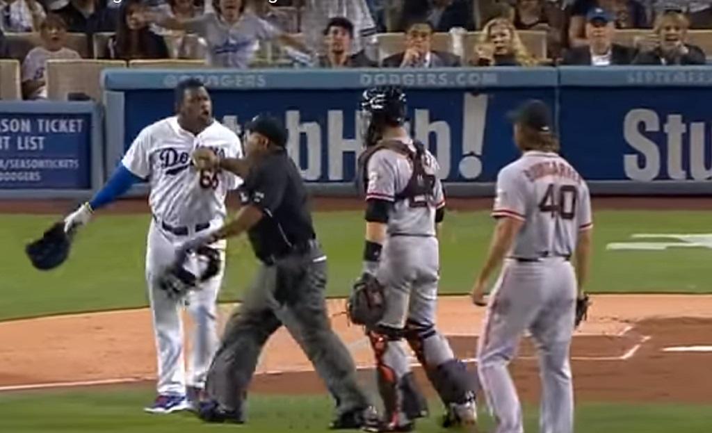 Yasiel Puig tries charging at pitcher Madison Bumgarner