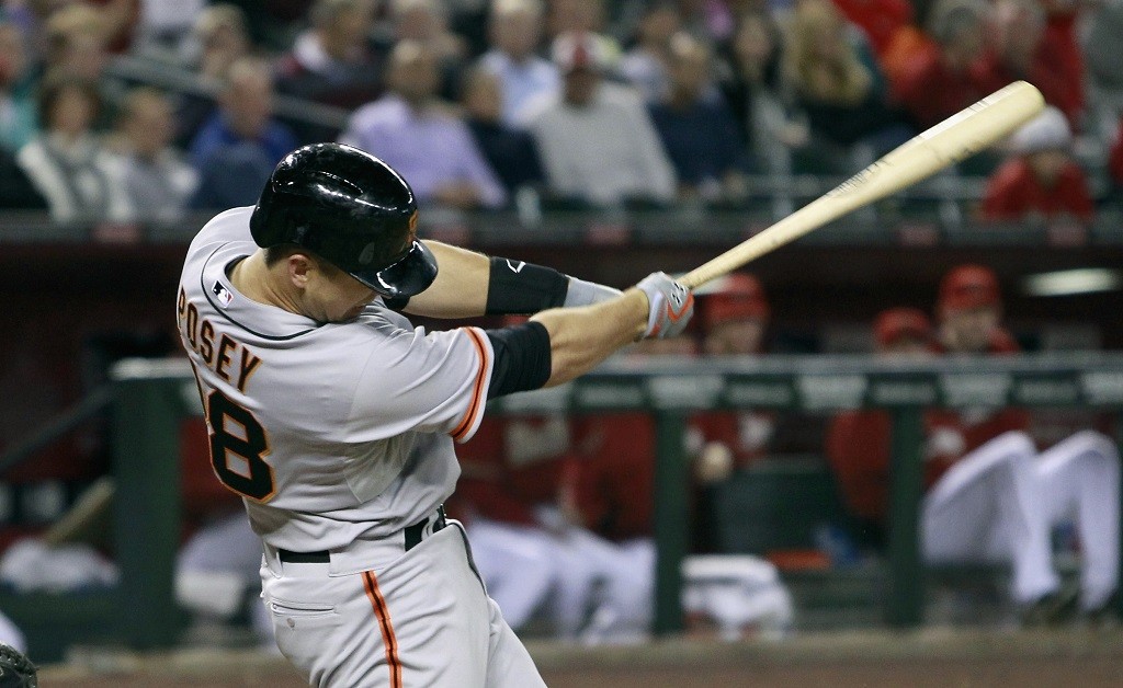 San Francisco Giants catcher Buster Posey swings for the fences