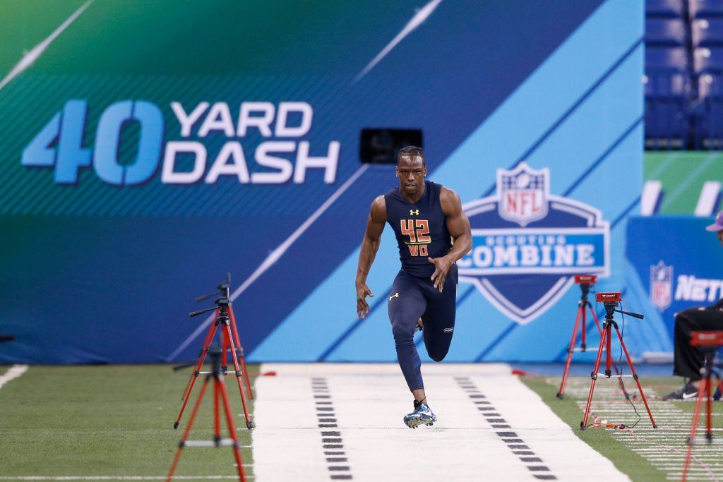 John Ross of the University of Washington runs the 40-yard dash at the NFL combine