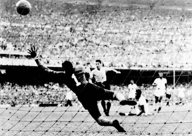 Uruguayan Juan 'Pepe' Schiaffino (C) scores the first goal against Brazil, during the1950 World Cup