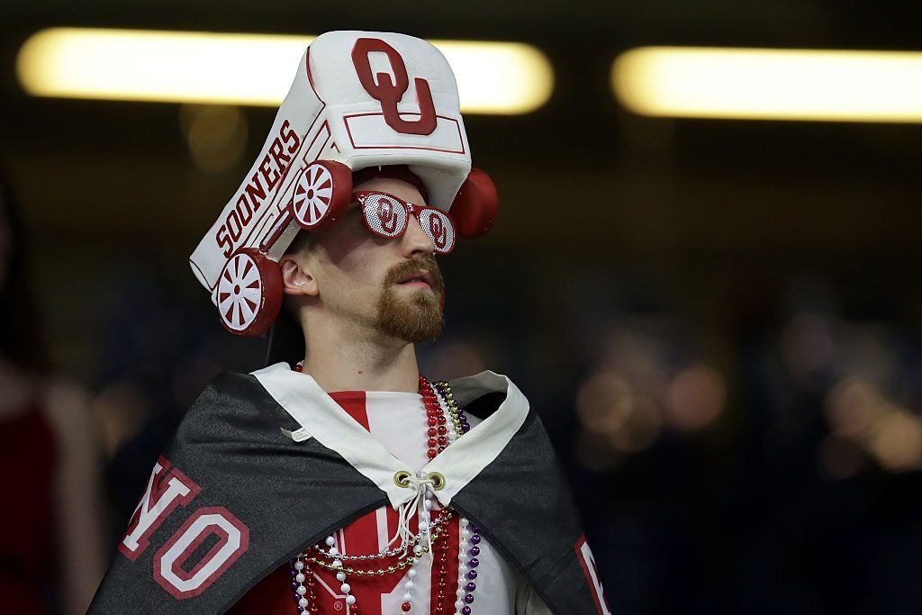 An Oklahoma Sooners fan looks on prior to the Sugar Bowl A fan of Oklahoma Sooners cheers prior to the Allstate Sugar Bowl at the Mercedes-Benz Superdome on January 2, 2017 in New Orleans, Louisiana.