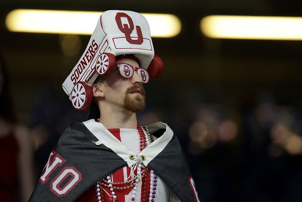 An Oklahoma Sooners fan looks on prior to the Sugar Bowl A fan of Oklahoma Sooners cheers prior to the Allstate Sugar Bowl at the Mercedes-Benz Superdome on January 2, 2017 in New Orleans, Louisiana.