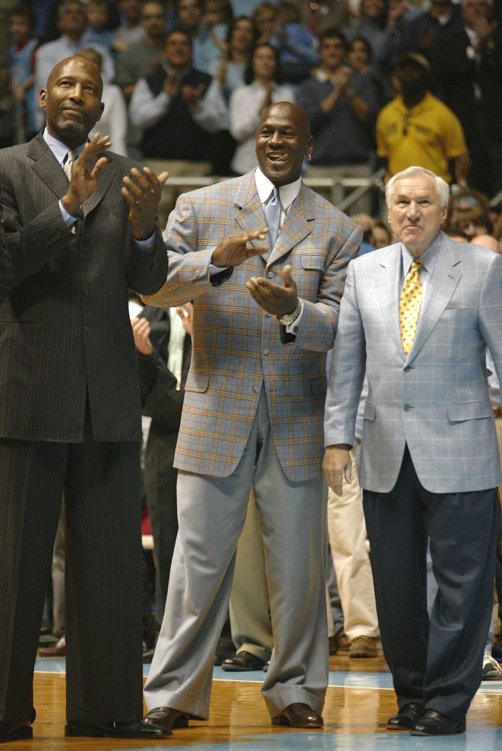 Michael Jordan, Dean Smith, and James Worthy at UNC Basketball game.