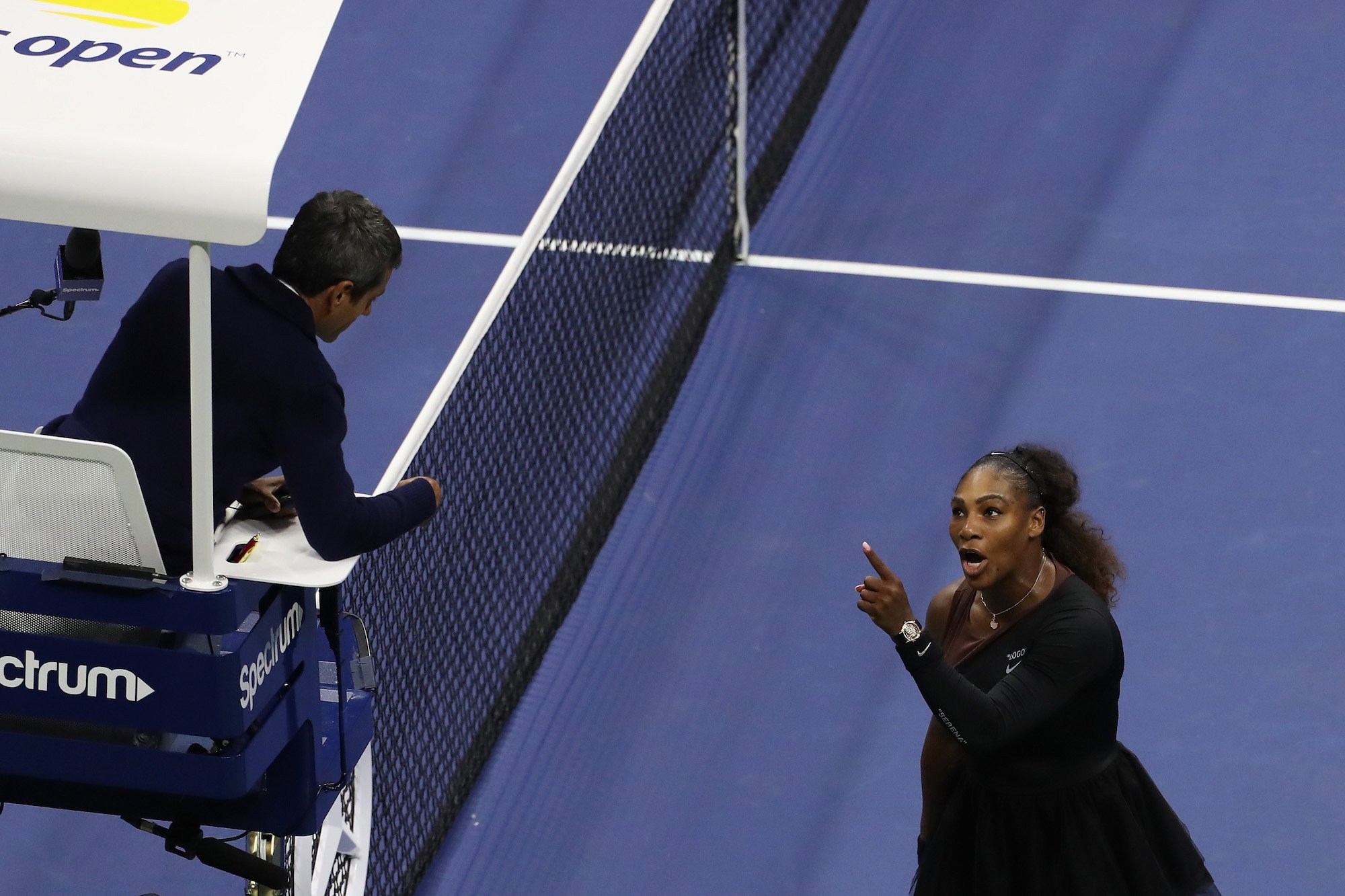 Serena Williams of the United States argues with umpire Carlos Ramos during her Women's Singles finals match against Naomi Osaka of Japan on Day Thirteen of the 2018 US Open
