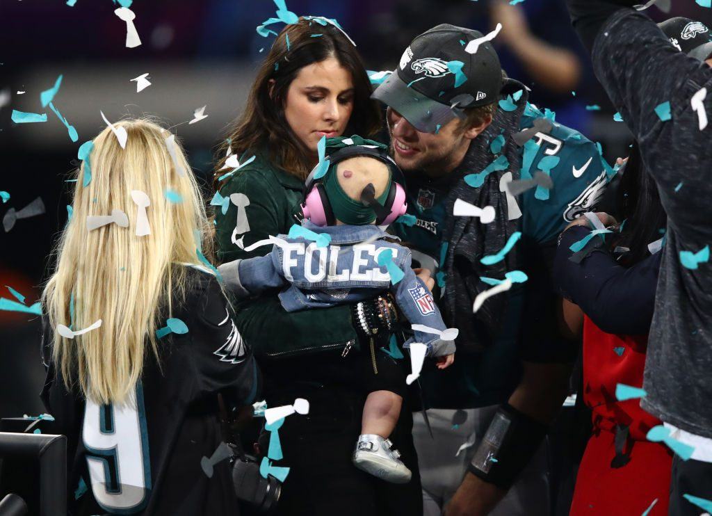 Nick Foles of the Philadelphia Eagles celebrates defeating the New England Patriots 41-33 with his wife Tori Nick Foles of the Philadelphia Eagles celebrates defeating the New England Patriots 41-33 with his wife Tori