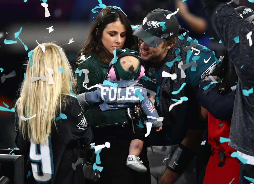 Nick Foles of the Philadelphia Eagles celebrates defeating the New England Patriots 41-33 with his wife Tori