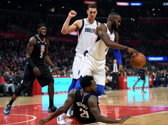 Tim Hardaway Jr. steps over Patrick Beverly