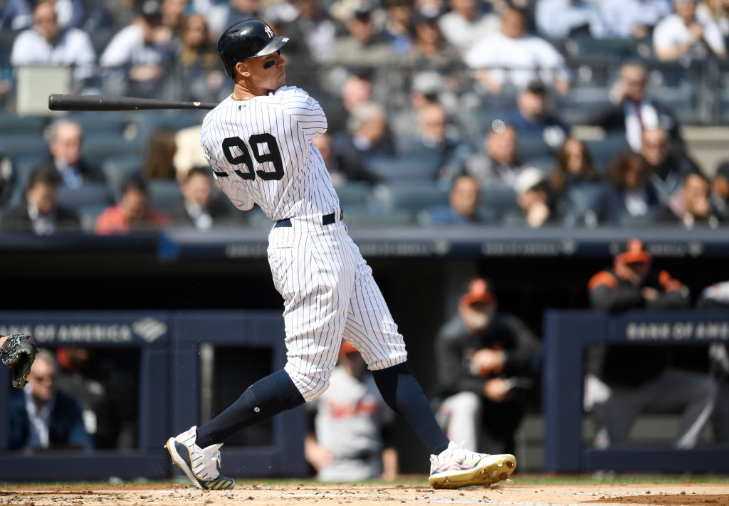 The Yankees Aaron Judge takes a cut in the first game of the 2019 season.