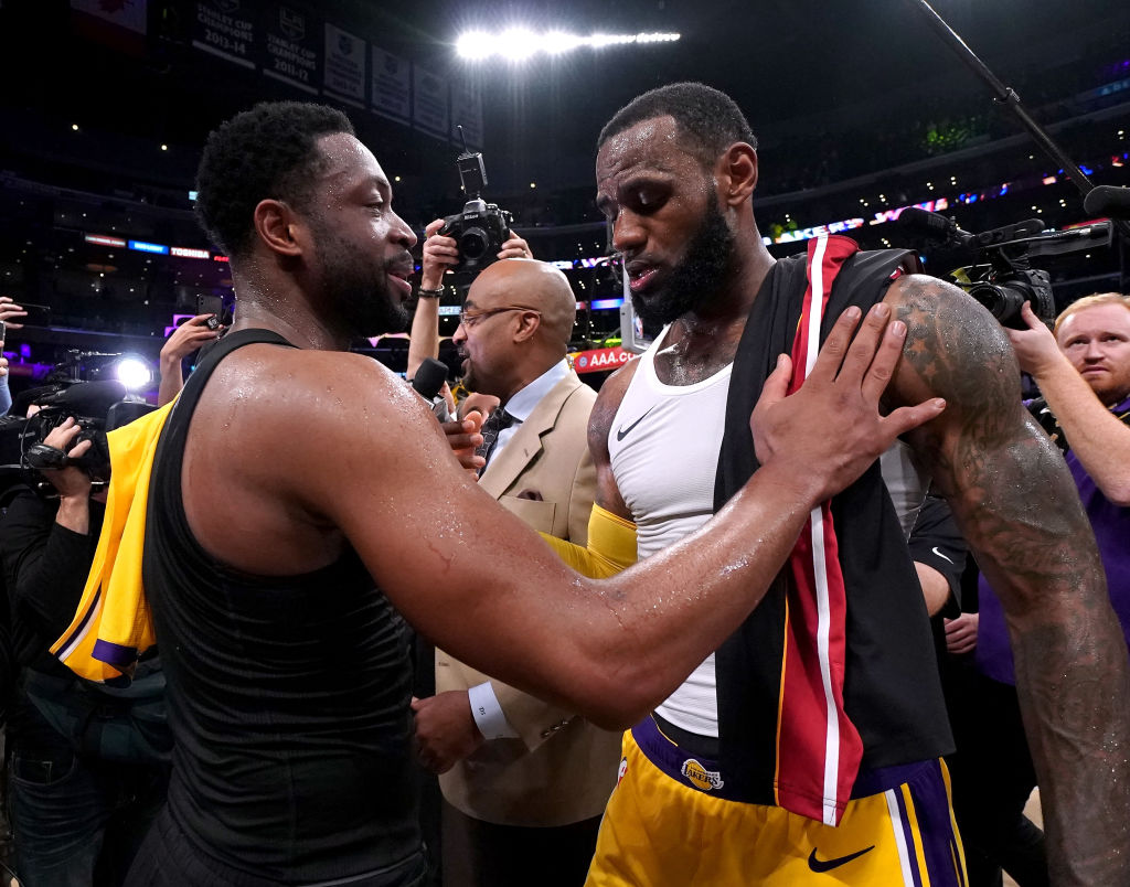 LeBron James (right) and Dwyane Wade have thoughts on teaming up again -- as owners