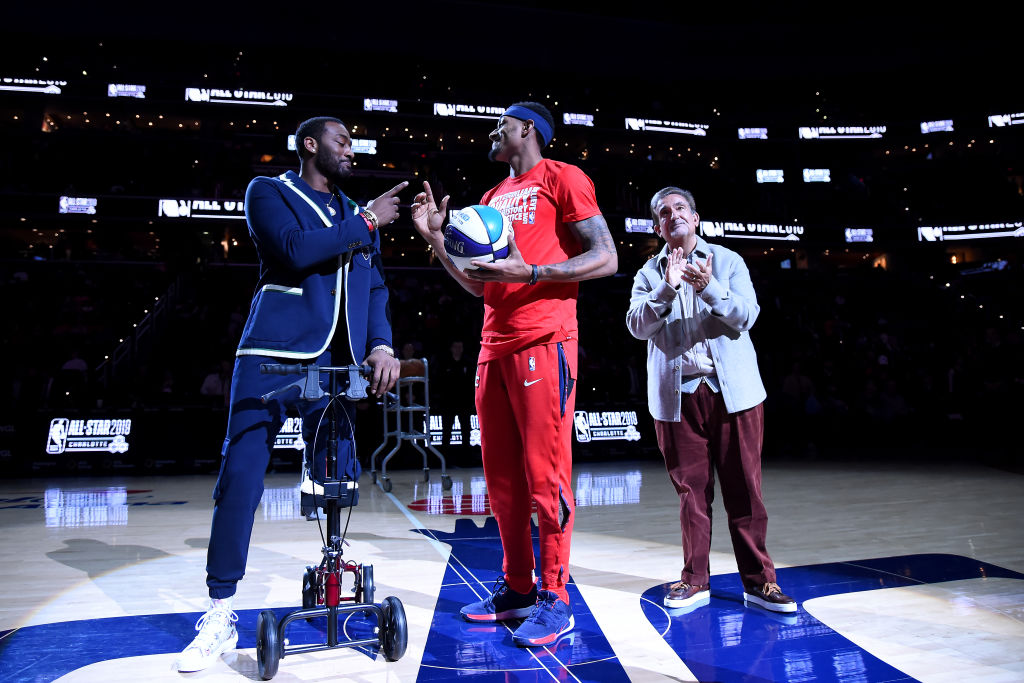 Gilbert Arenas says the Washington Wizards need to be concerned about the future of John Wall (left) given his injury history.