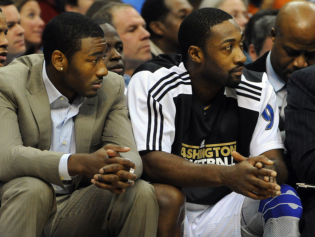 Gilbert Arenas (right) says the Washington Wizards need to be concerned about the future of John Wall (left) given his injury history.
