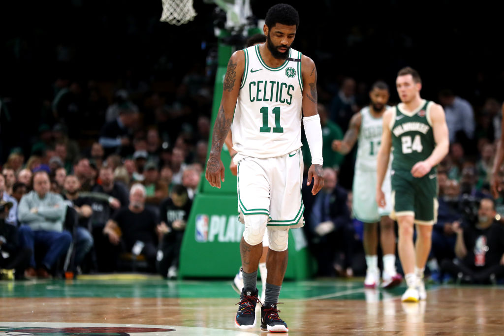 kyrie irving staying with celtics