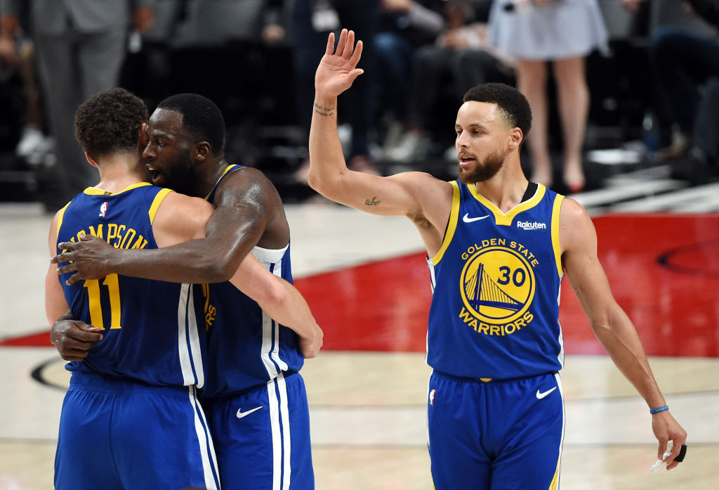 Who might join Stephen Curry (right) and Draymond Green (center) in the Golden State Warriors lineup in 2019-20?