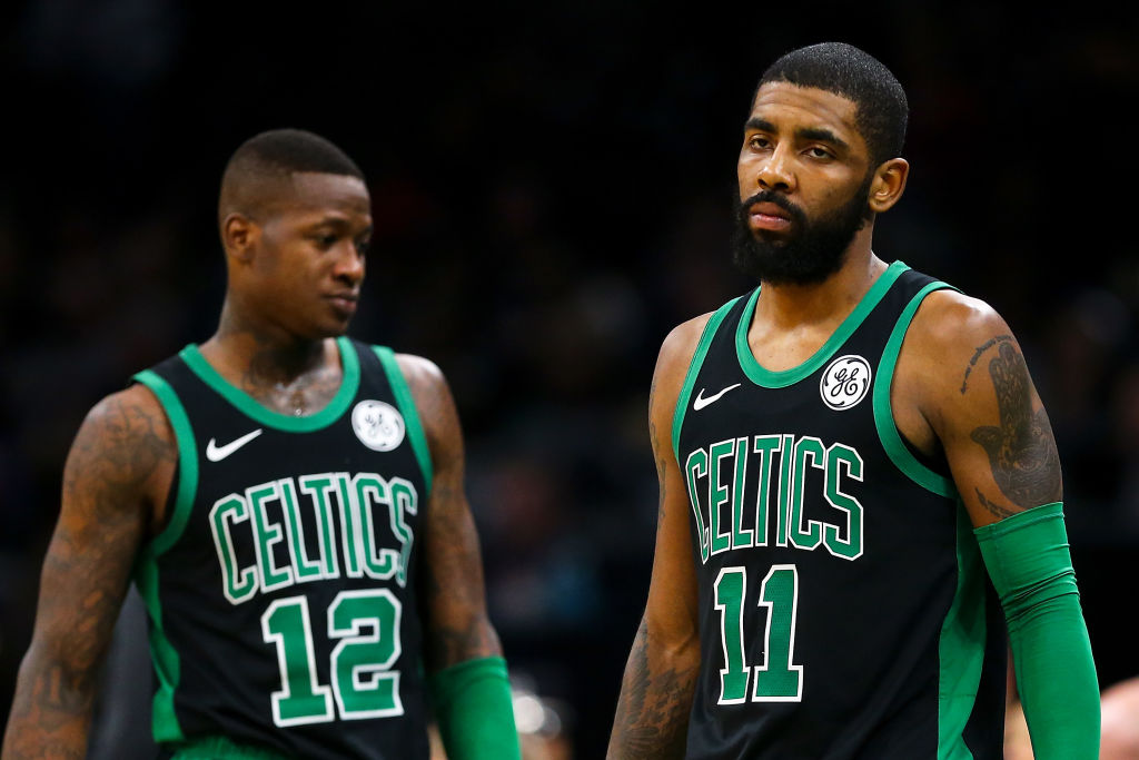 Terry Rozier (left) sounds like he wants to leave the Celtics behind, especially if Kyrie Irving stays.