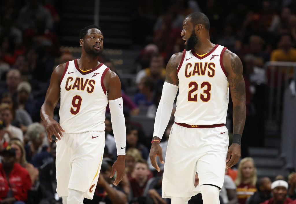 Dwyane Wade (left) and LeBron James will be seeing a lot of each other when their sons play on the same high school basketball team.