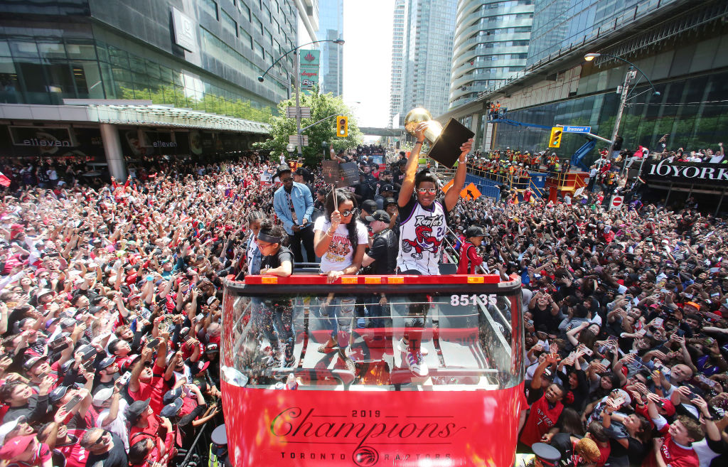 Kyle Lowry with the Larry O'Brien NBA Championship Trophy