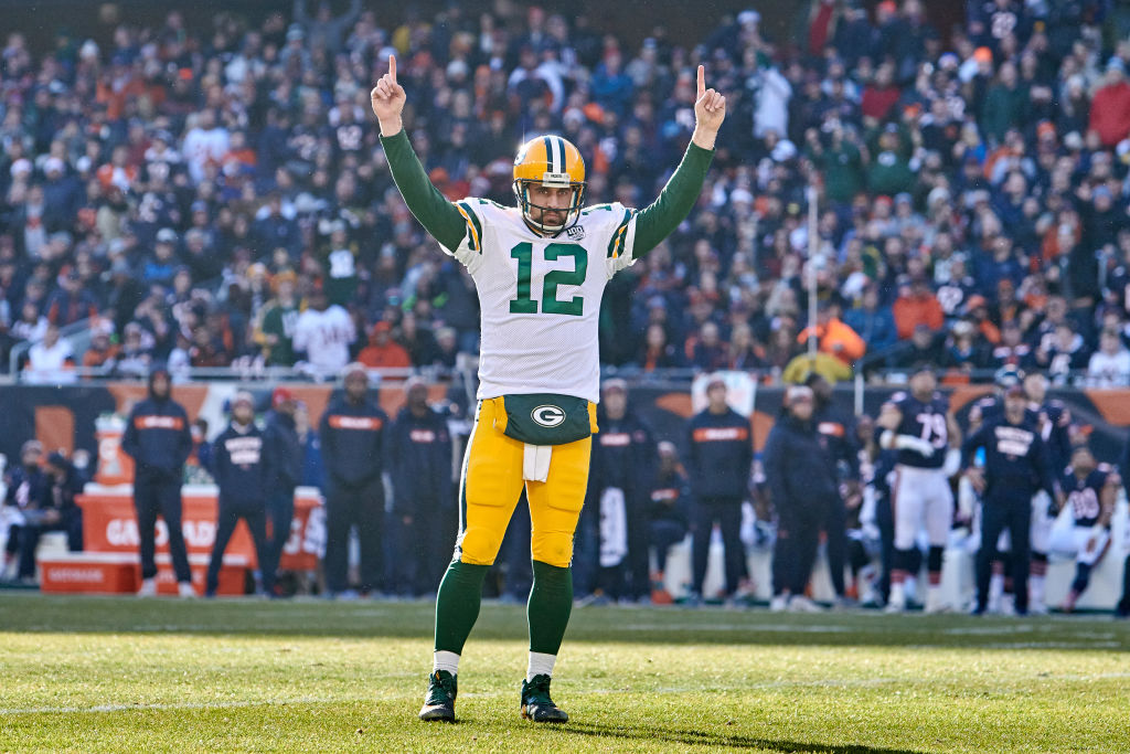 Aaron Rodgers celebrates a touchdown pass