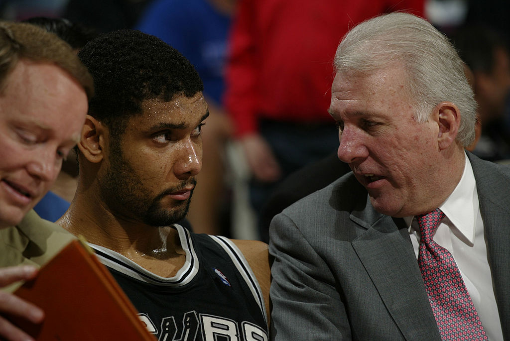 TIM DUNCAN and coach GREGG POPOVICH during Game 4 of the NBA Finals
