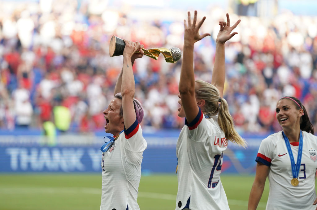 USA's Megan Rapinoe celebrates with the FIFA Women's World Cup Trophy