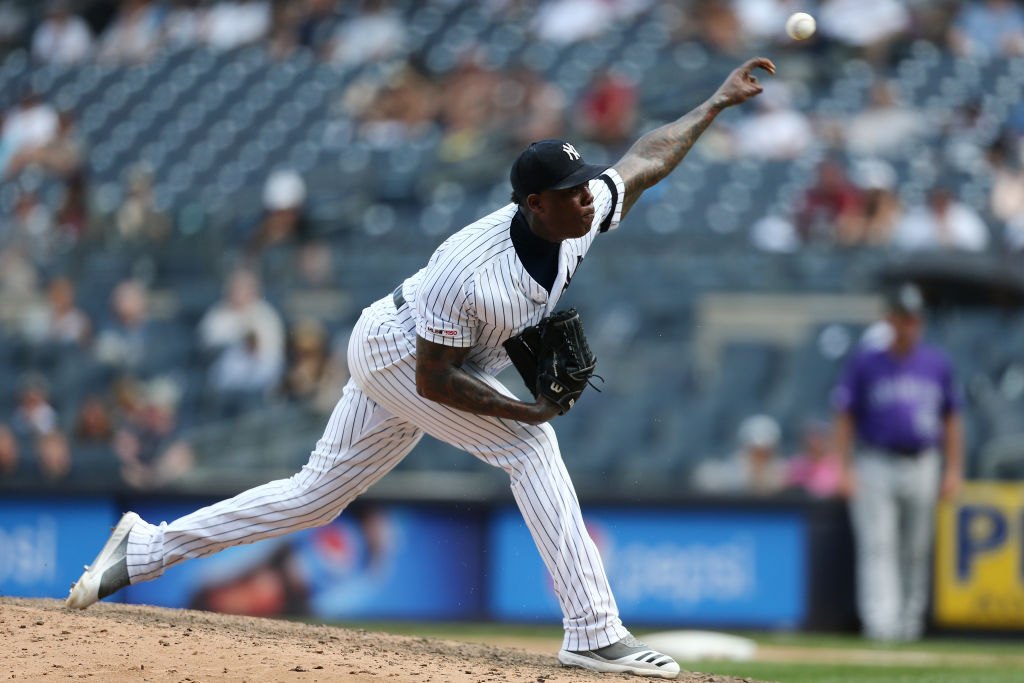 Aroldis Chapman pitches against the Colorado Rockies