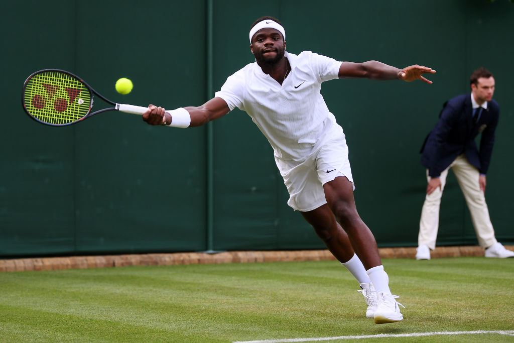 Frances Tiafoe making a play at Wimbledon