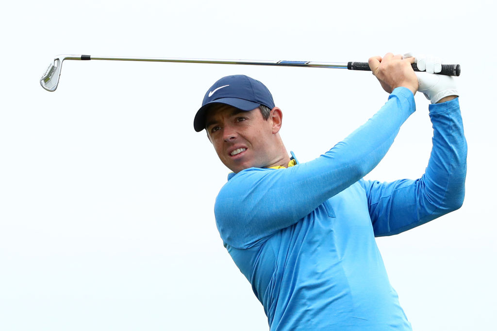 Rory McIlroy plays a shot during a practice round