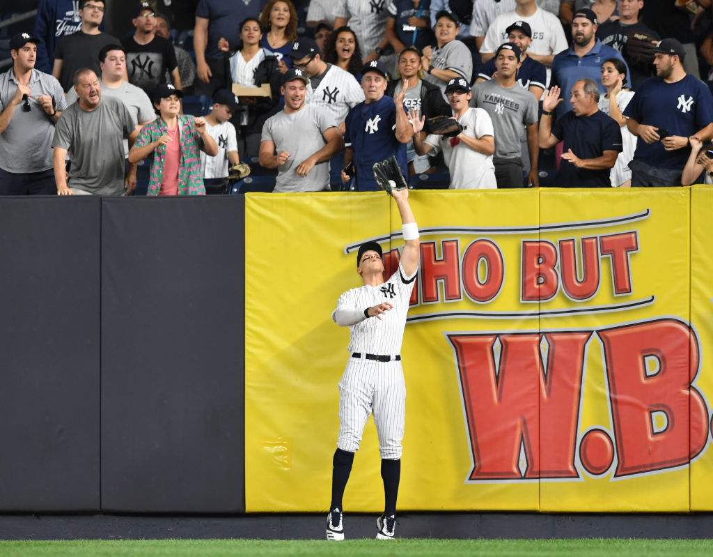 Aaron Judge catches a fly ball hit by Austin Meadows