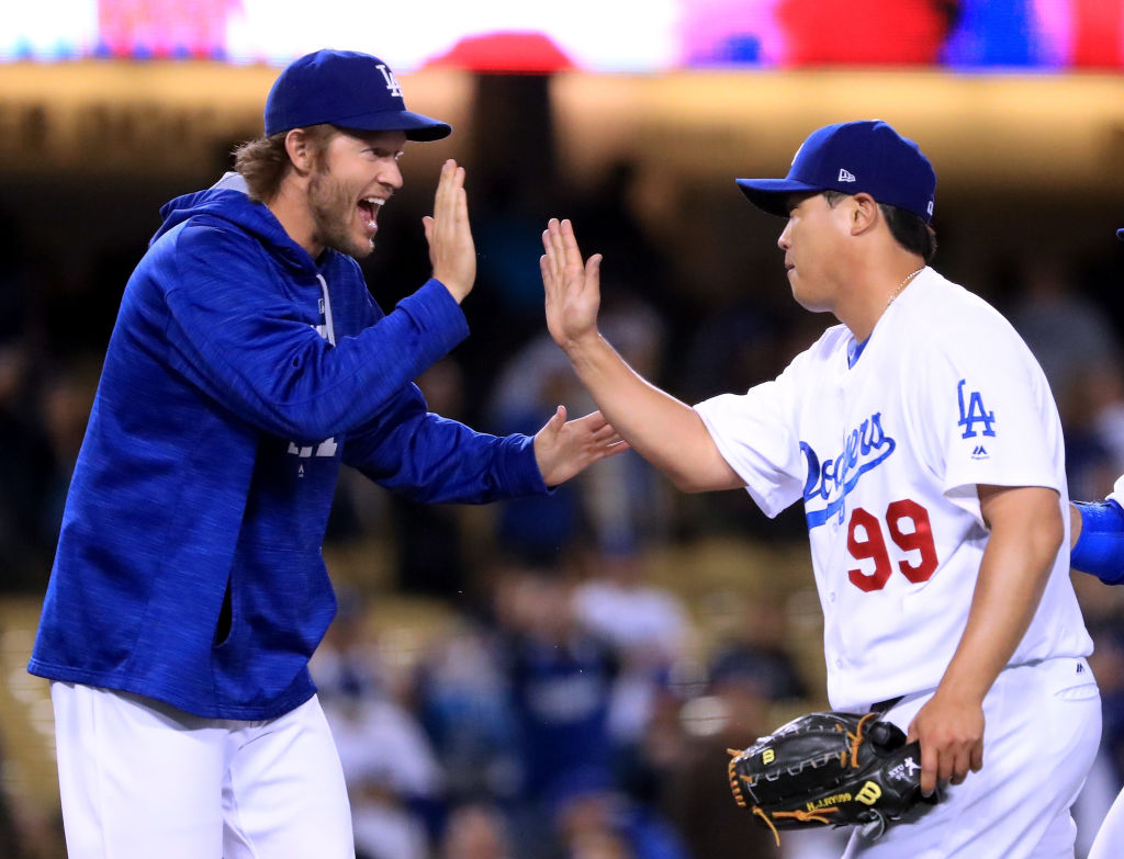 Hyun-jin Ryu and Clayton Kershaw celebrate a win