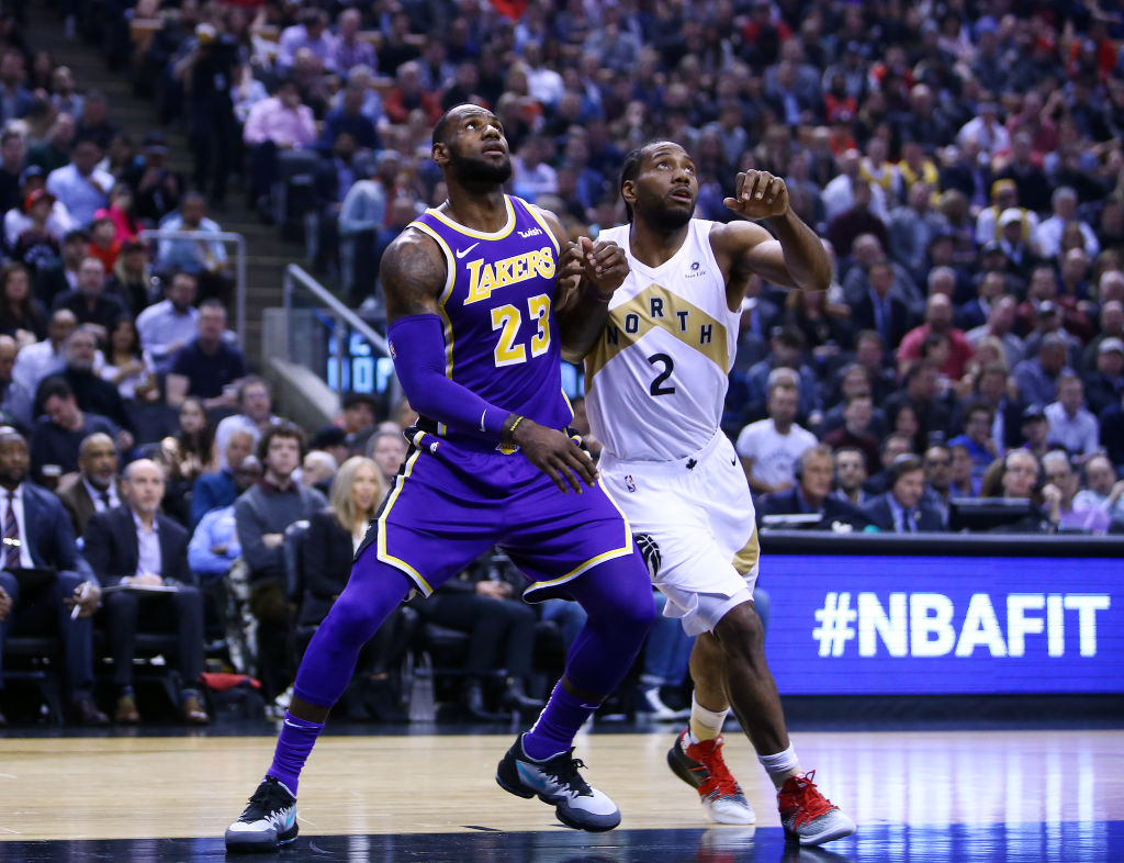 Kawhi Leonard (right) waited a long time to sign during NBA free agency in 2019, but he didn't intentionally do it to sabotage the Lakers' offseason.