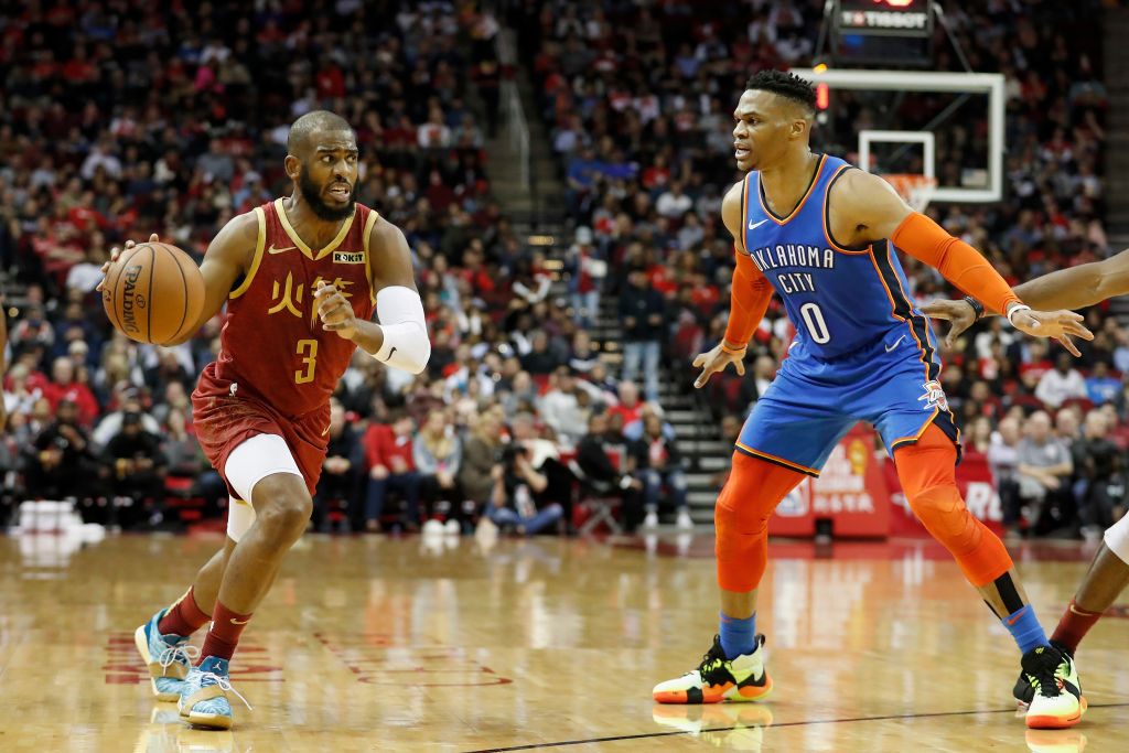 Chris Paul (left) and Russell Westbrook swap teams with Paul to the Thunder and Westbrook to the Rockets in a blockbuster trade.