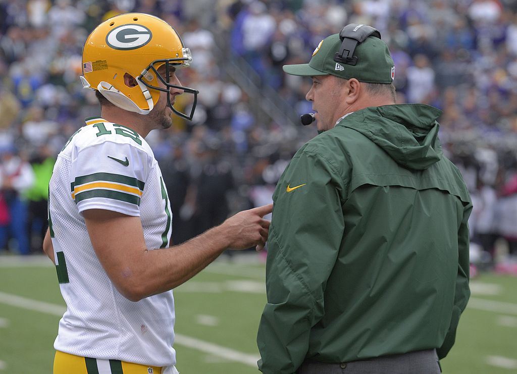 Packers quarterback Aaron Rodgers former coach Mike McCarthy (right) had run-ins at the end, but Rodgers has a good rapport with new head coach Matt LaFleur.