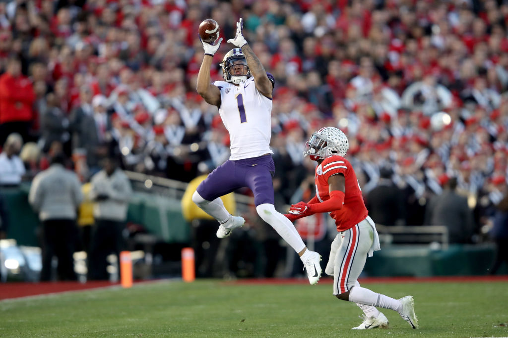 Hunter Bryant goes up for a catch in the Rose Bowl