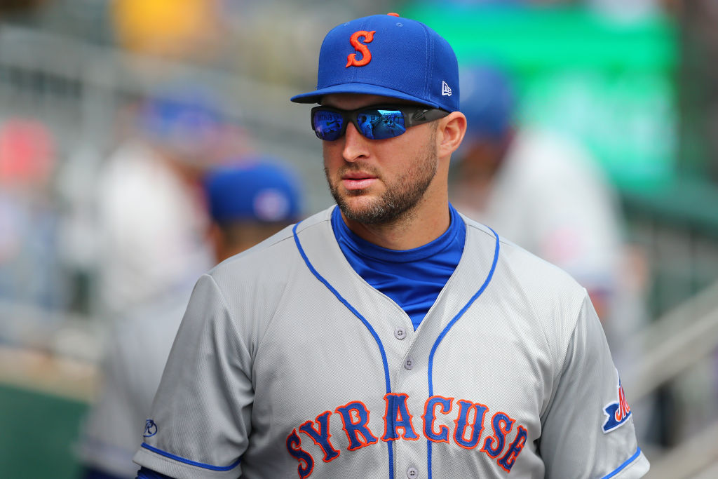 Tim Tebow #15 of the Syracuse Mets in action