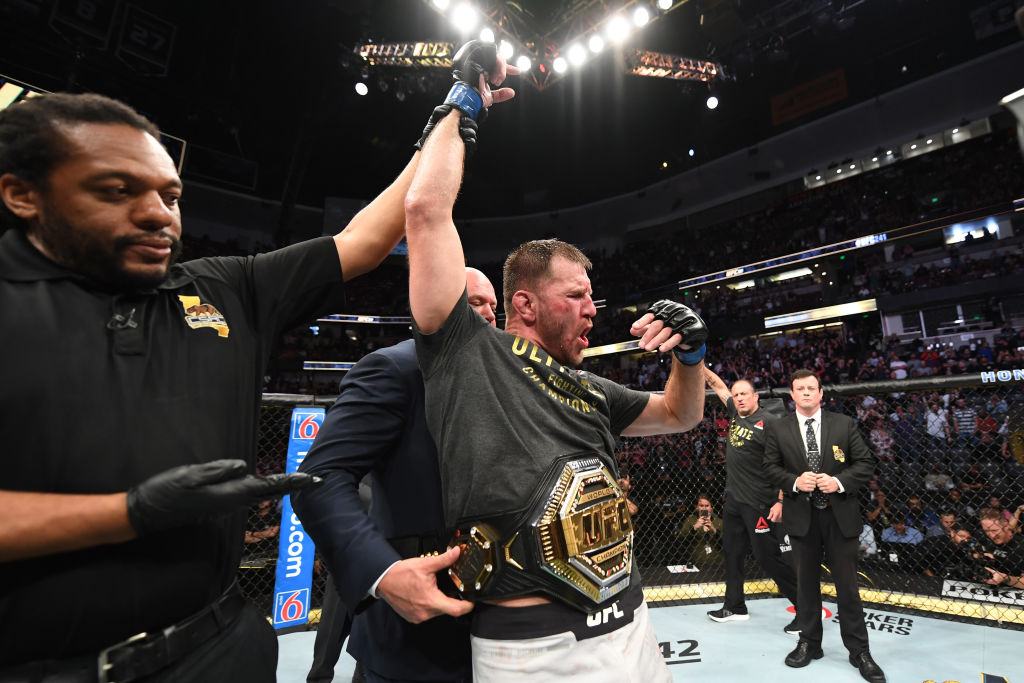 Stipe Miocic celebrates his TKO victory over Daniel Cormier