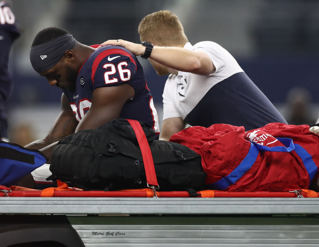 Lamar Miller was carted off the field in Houston's 34-0 loss to Dallas