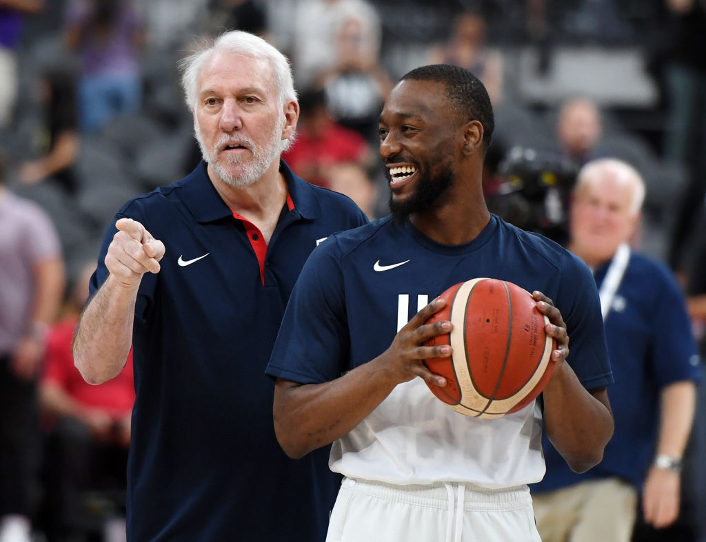 Gregg Popovich (left) likes that Kemba Walker and the other Team USA players for the 2019 FIBA World Cup want to be there.
