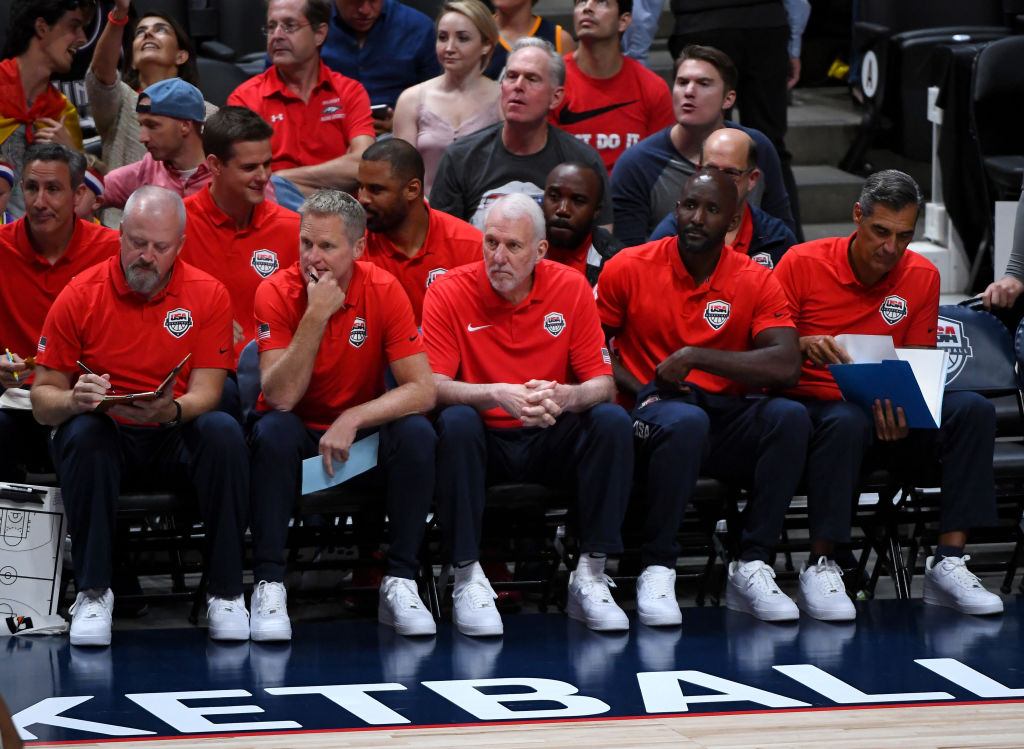 Warriors coach Steve Kerr (front row, second from left) doesn't hold back his praise for Gregg Popovich (front, third from left) and the Spurs.