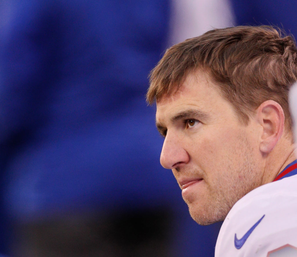 New York Giants - Eli Manning sits on bench