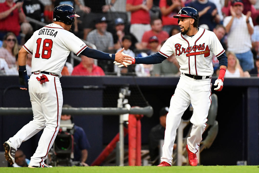 Adding Billy Hamilton (right) might be the key move to boost the Braves' postseason chances.