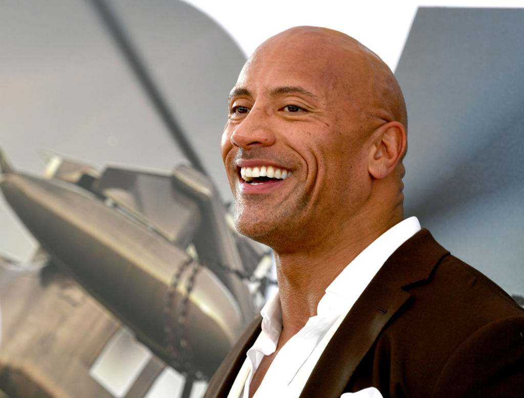 Dwayne Johnson arrives at the premiere of Universal Pictures